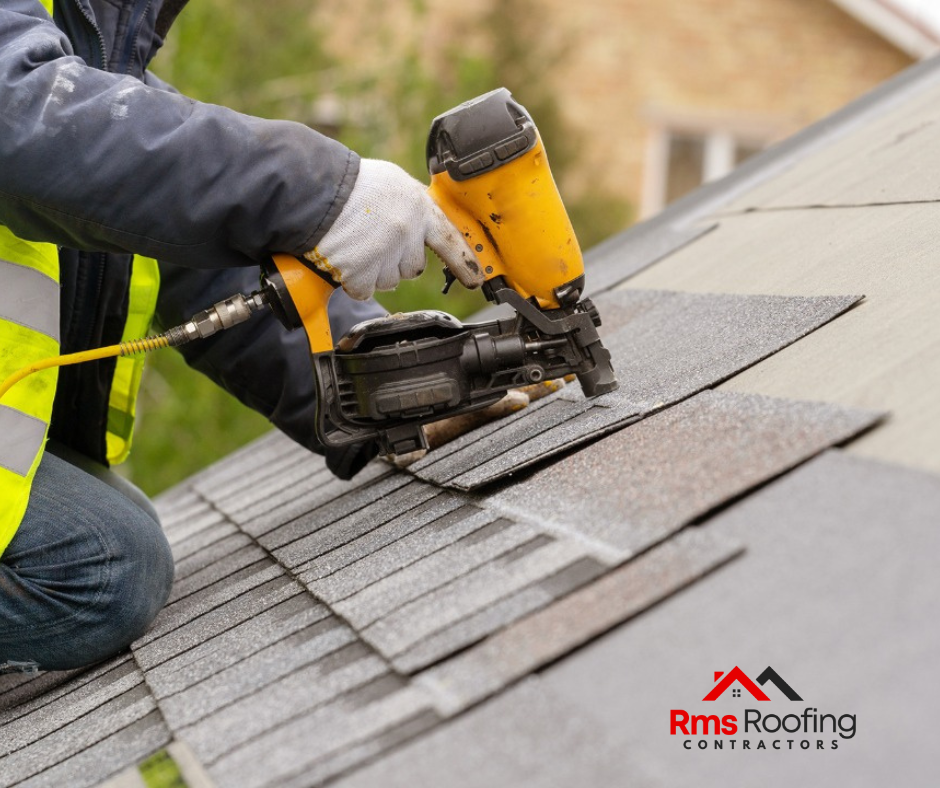 Inspector examining the alignment of shingles and flashing during a final roofing installation inspection.